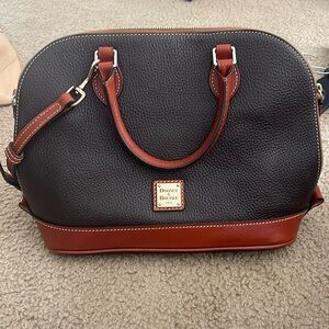 Dooney and Bourke never used ZipZip